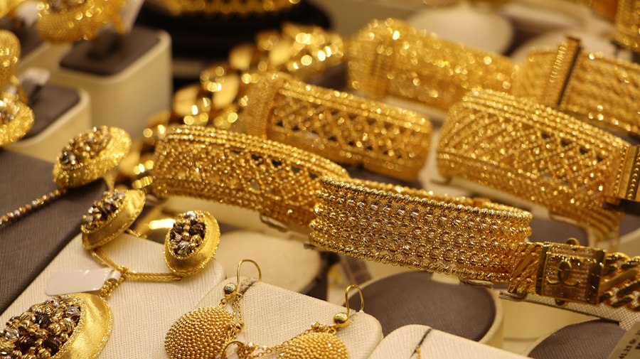 Gold jewellery on display in a jeweller's shop
