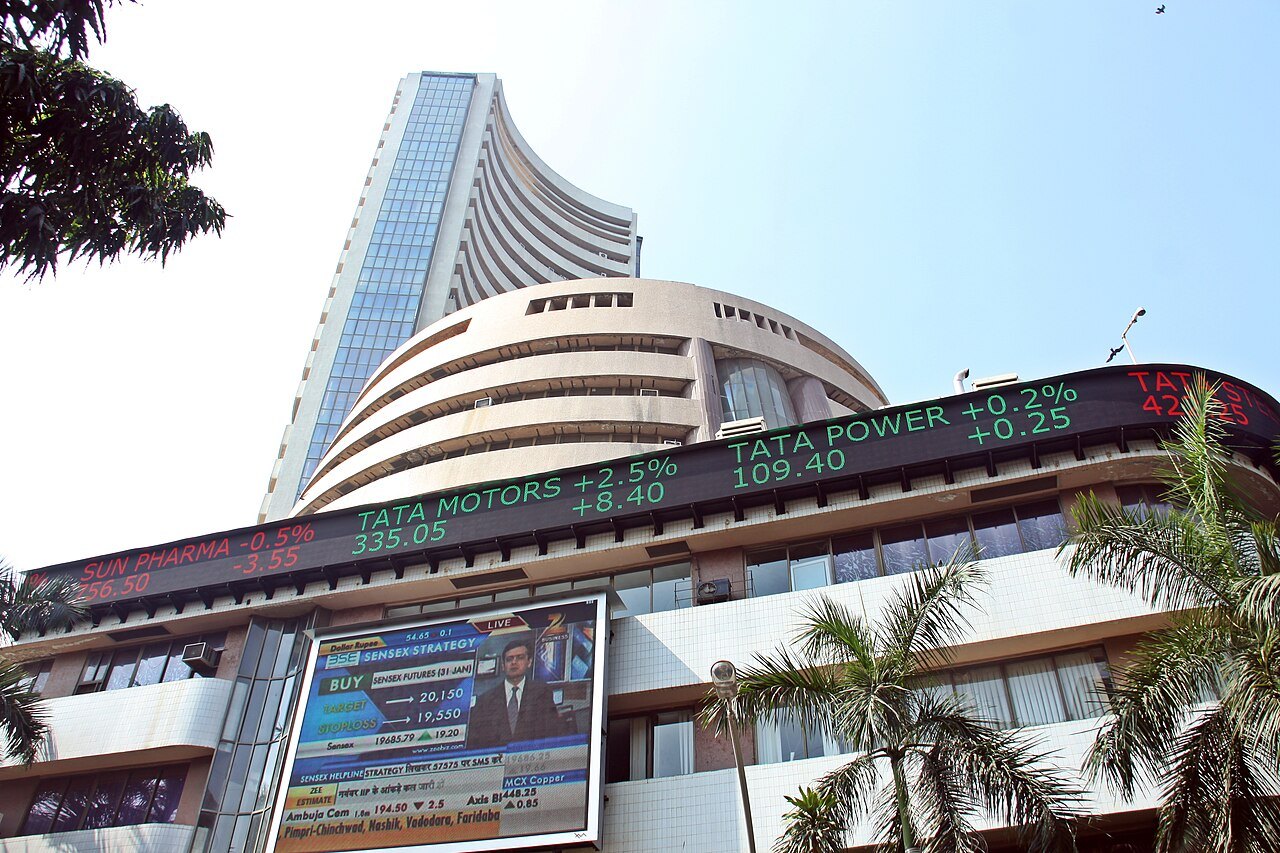 The BSE building, Phiroze Jeejeebhoy Towers, on Dalal Street in Mumbai, with its market ticker, under a clear blue sky
