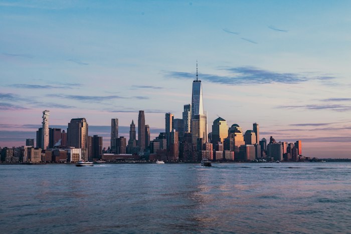 The Manhattan skyline across the Hudson River at golden hour